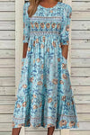 DARCIE | FLOWING DRESS WITH PETALS AND ELEGANT TUMMY COVERAGE